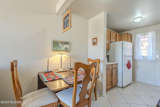 dining room featuring light tile patterned floors