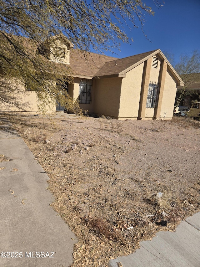 view of front of home with stucco siding