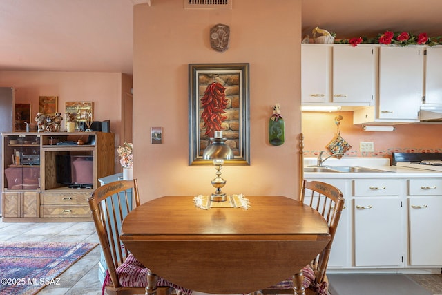 dining space featuring visible vents