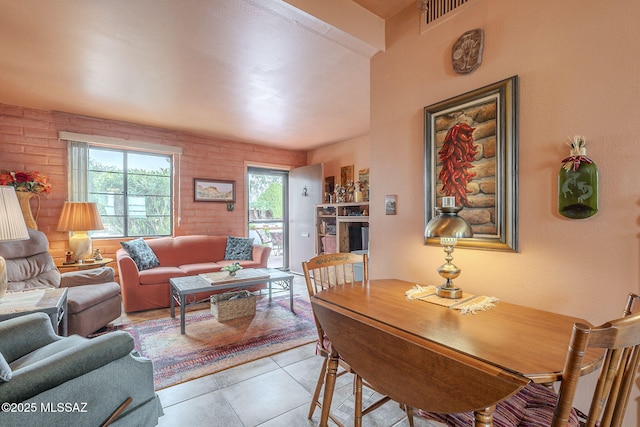dining room with light tile patterned floors and visible vents