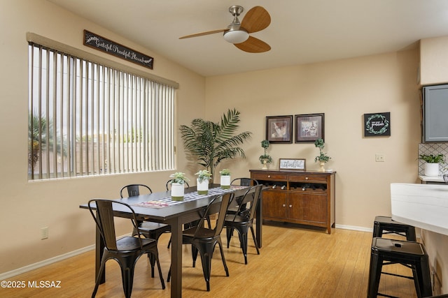 11219 N Platte Dr, Oro Valley, AZ 85737 - dining area featuring baseboards, light wood-type flooring, and ceiling fan