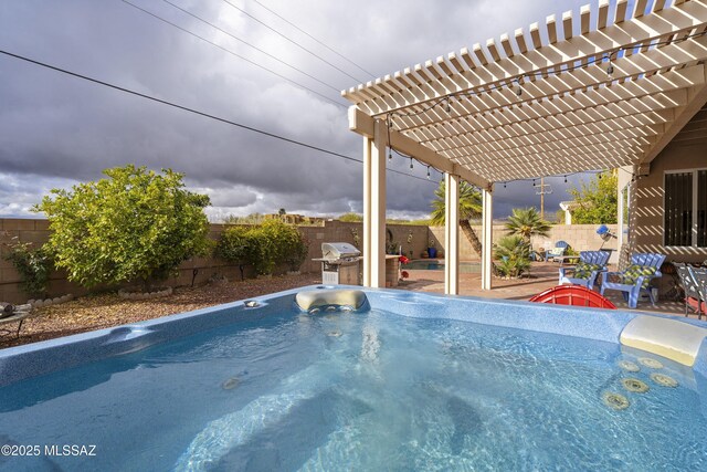 11219 N Platte Dr, Oro Valley, AZ 85737 - view of swimming pool with a patio, area for grilling, a fenced backyard, and a hot tub
