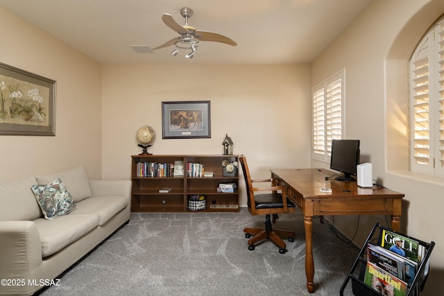 11219 N Platte Dr, Oro Valley, AZ 85737 - carpeted home office with visible vents and a ceiling fan