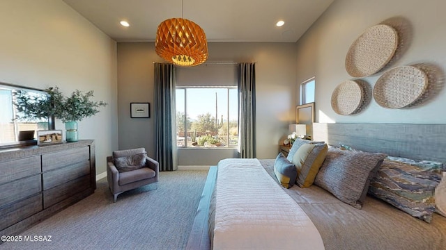 bedroom featuring recessed lighting, multiple windows, carpet, and baseboards