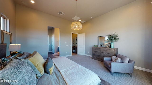 bedroom featuring visible vents, a high ceiling, baseboards, and carpet floors