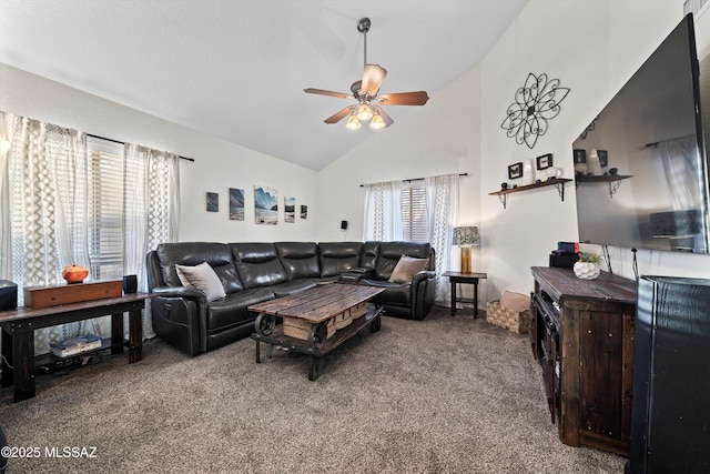 living room featuring high vaulted ceiling, a ceiling fan, and carpet floors