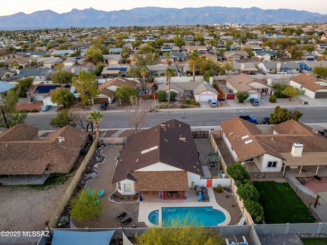 aerial view featuring a mountain view and a residential view