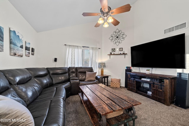 carpeted living room featuring visible vents, high vaulted ceiling, and ceiling fan