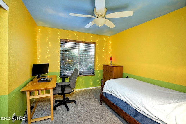 bedroom with baseboards, a ceiling fan, and carpet floors