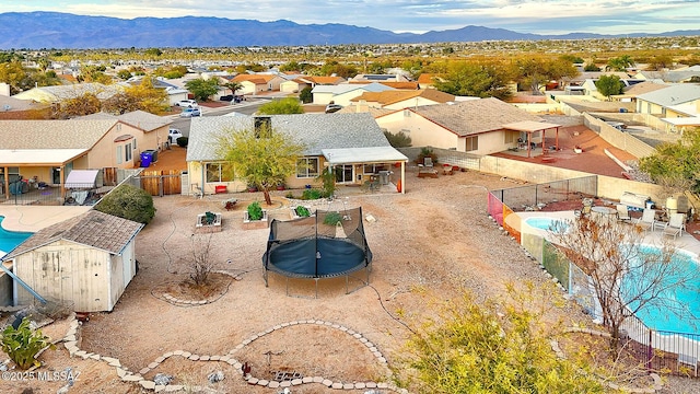 aerial view with a mountain view and a residential view