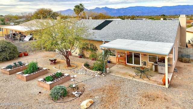 exterior space featuring a mountain view