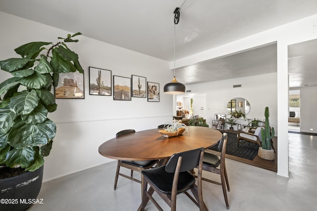 dining room with visible vents