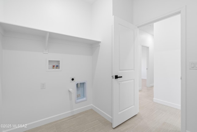 washroom with laundry area, hookup for a washing machine, electric dryer hookup, and baseboards