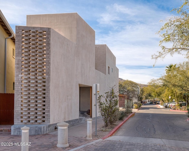 exterior space with stucco siding