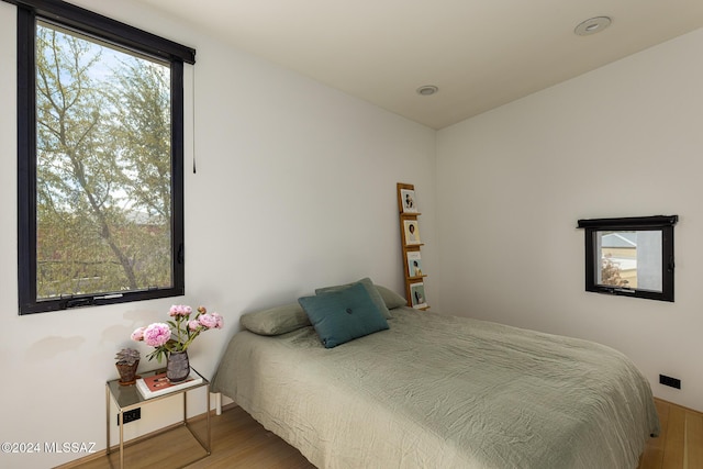 bedroom featuring wood finished floors