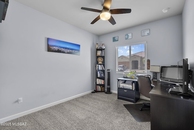 office area featuring baseboards and a ceiling fan