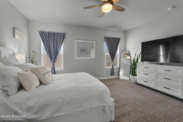 bedroom featuring baseboards, carpet, and a ceiling fan