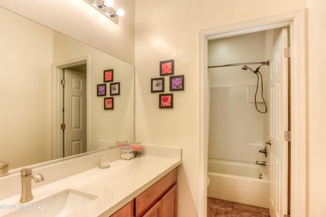 full bath featuring shower / bath combination, toilet, vanity, and tile patterned flooring