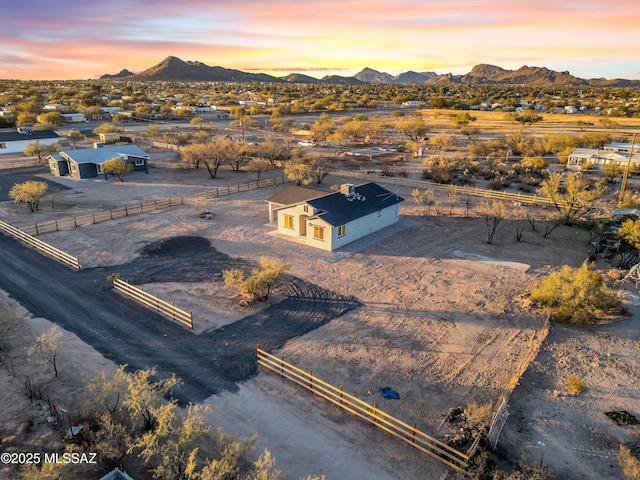 drone / aerial view featuring a mountain view