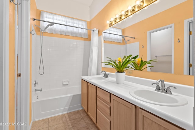 full bath featuring a sink, tile patterned flooring, double vanity, and shower / bath combination with curtain