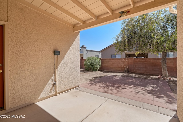 view of patio / terrace with fence