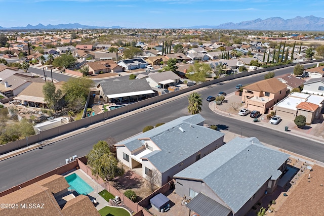 bird's eye view with a mountain view and a residential view