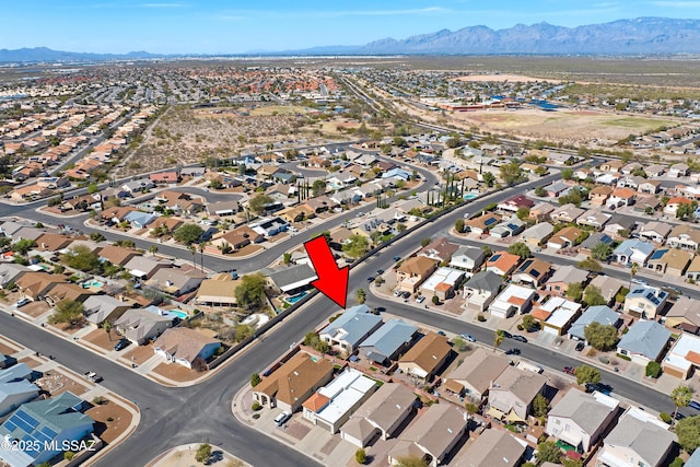 aerial view featuring a residential view and a mountain view