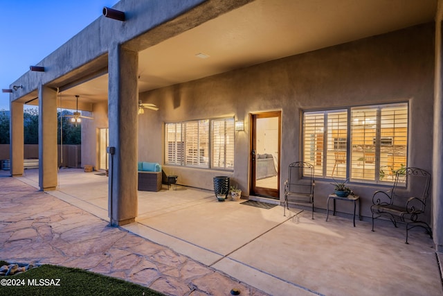 view of patio featuring a ceiling fan