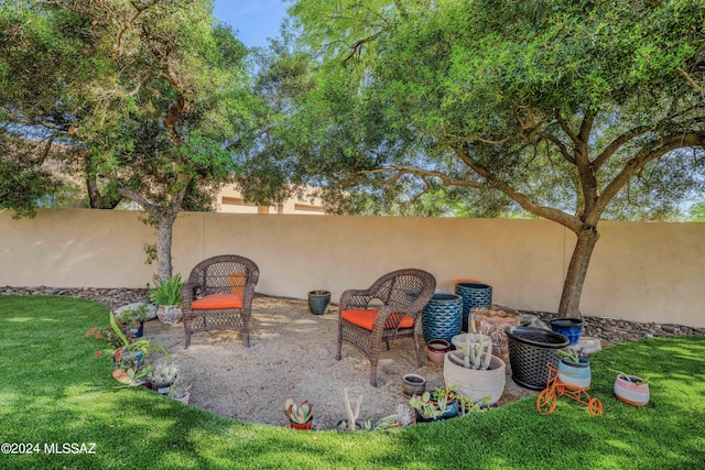 view of yard featuring a patio and a fenced backyard