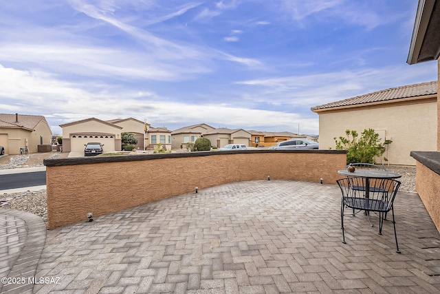 view of patio featuring a residential view