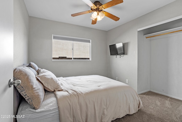 bedroom with baseboards, carpet, and a ceiling fan