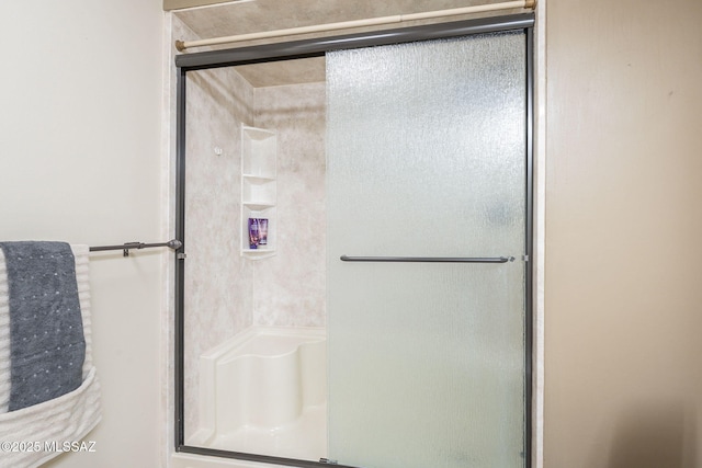 full bathroom with a stall shower