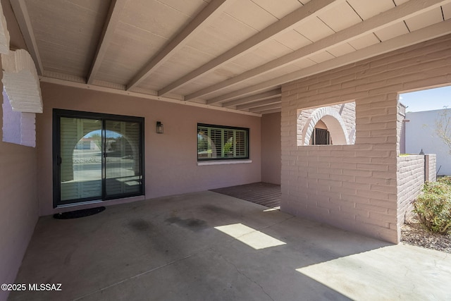 view of patio with a carport