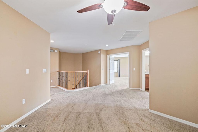 carpeted empty room with recessed lighting, visible vents, ceiling fan, and baseboards