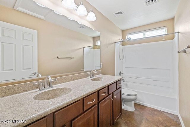 full bath with a sink, visible vents, and toilet