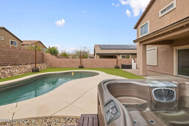 view of swimming pool featuring a patio, a fenced in pool, and a fenced backyard