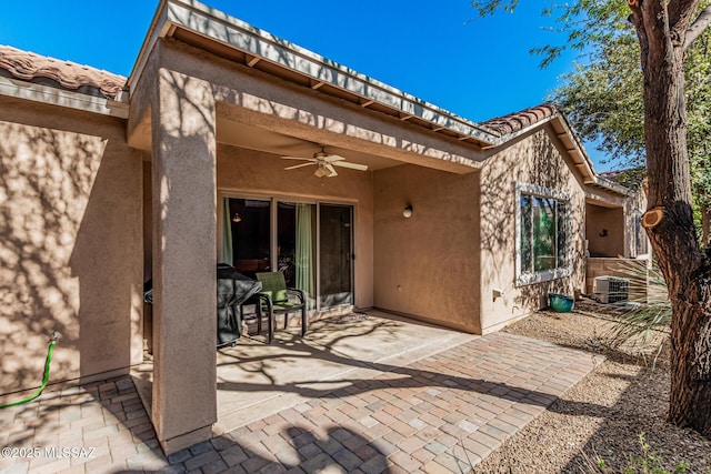 view of patio / terrace featuring central AC and ceiling fan