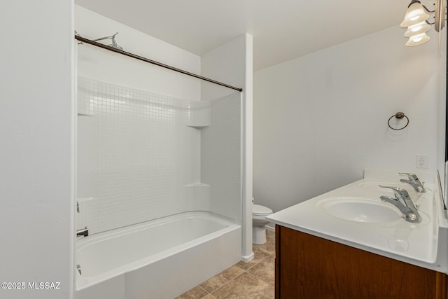 full bath with double vanity, toilet, bathing tub / shower combination, and a sink