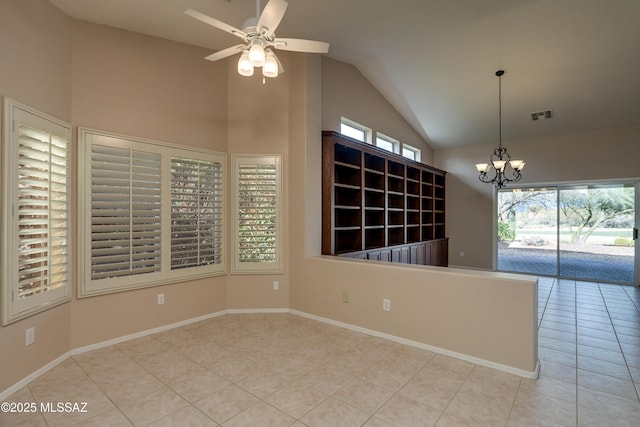 tiled spare room with visible vents, baseboards, high vaulted ceiling, and ceiling fan with notable chandelier
