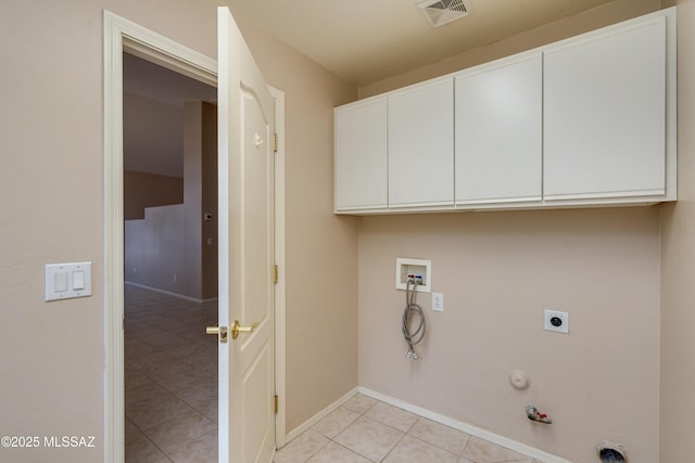 laundry room with visible vents, gas dryer hookup, light tile patterned floors, hookup for a washing machine, and hookup for an electric dryer