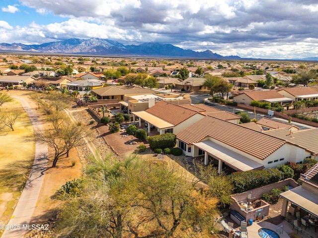 birds eye view of property featuring a mountain view and a residential view