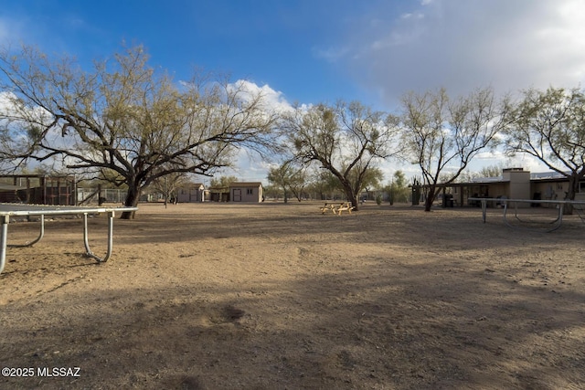 view of yard featuring a trampoline