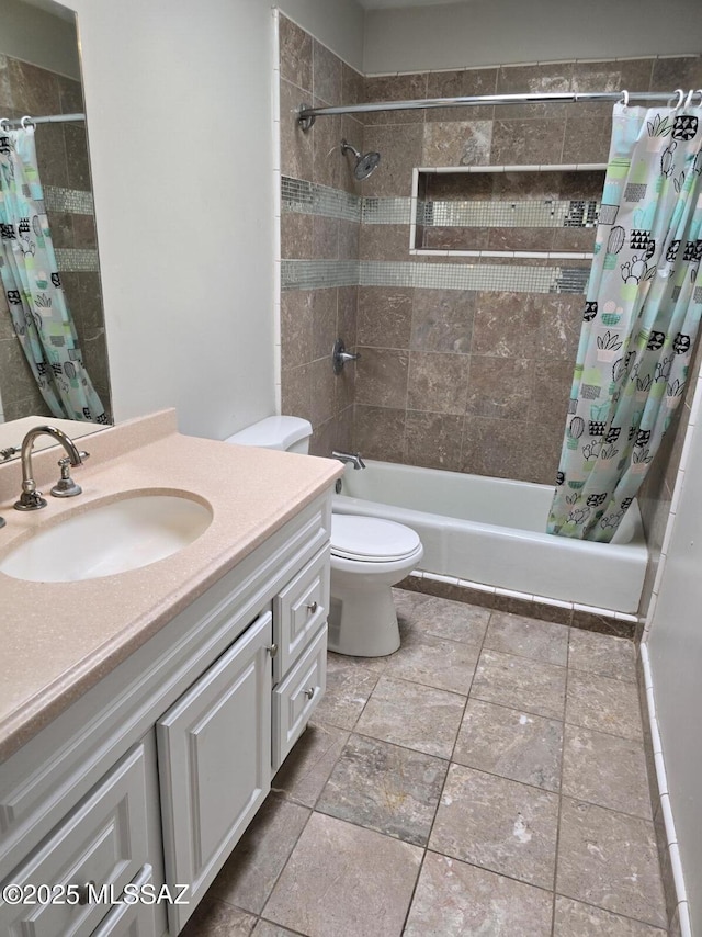 bathroom featuring shower / tub combo with curtain, vanity, and toilet