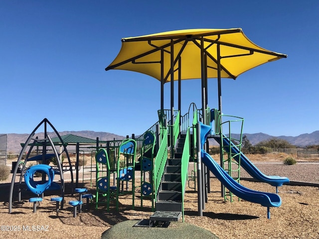 communal playground with a mountain view