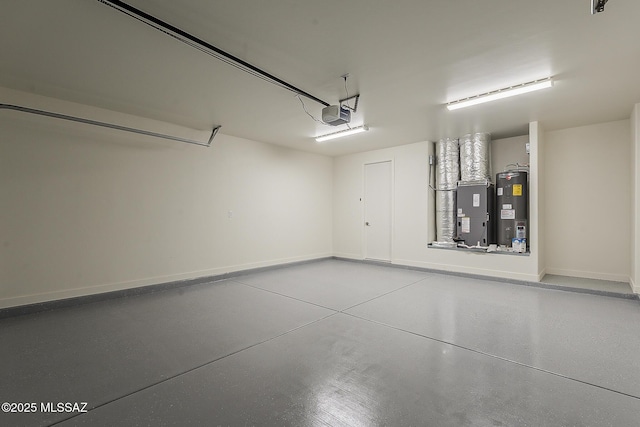 garage with water heater, a garage door opener, and baseboards