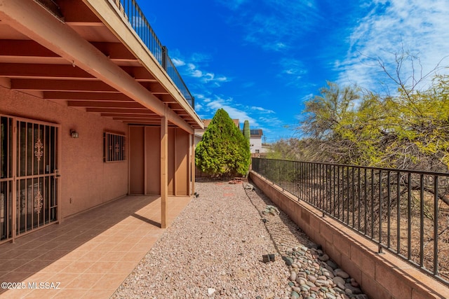 view of patio / terrace with fence