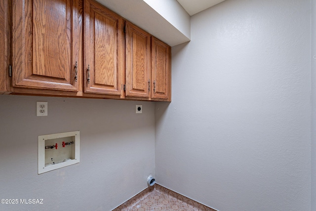 laundry room featuring cabinet space, hookup for an electric dryer, and hookup for a washing machine