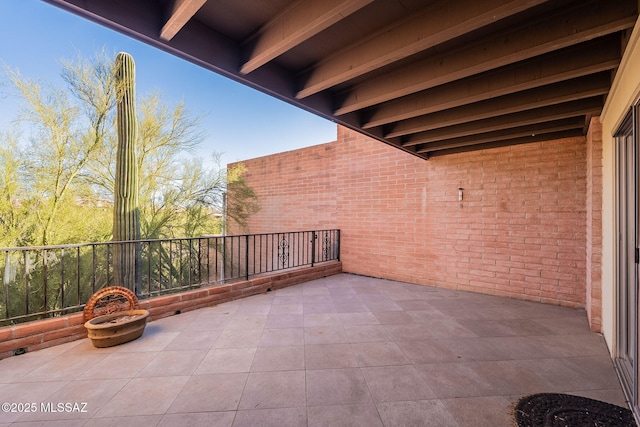 view of patio with a balcony