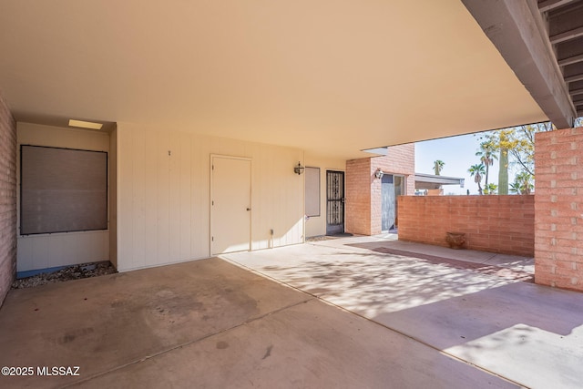 view of patio / terrace featuring fence