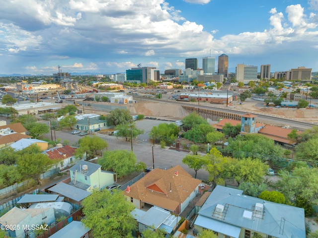 birds eye view of property with a view of city